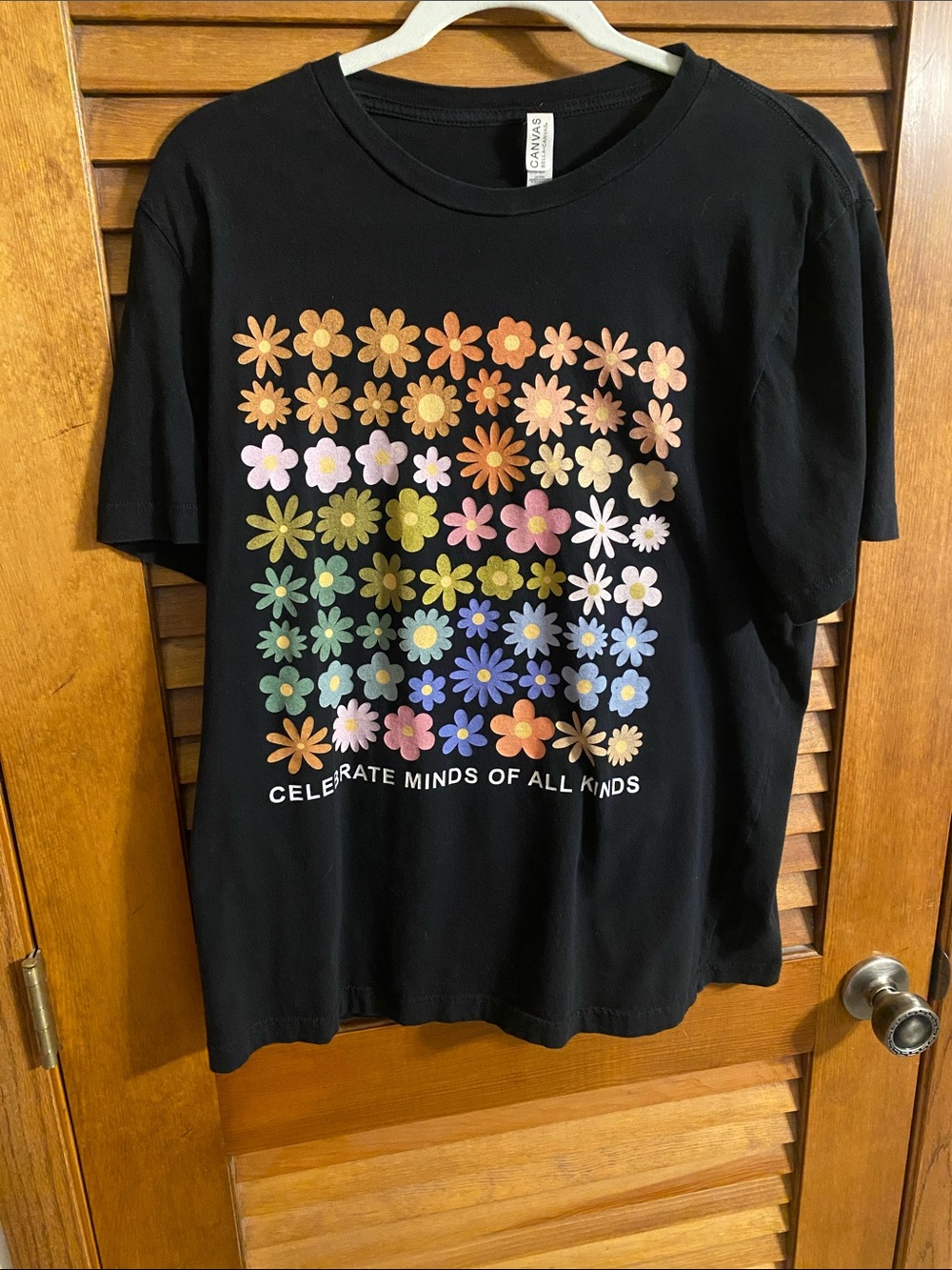 Bella Canvas Black Tee with Multicolor Daisy Grid
